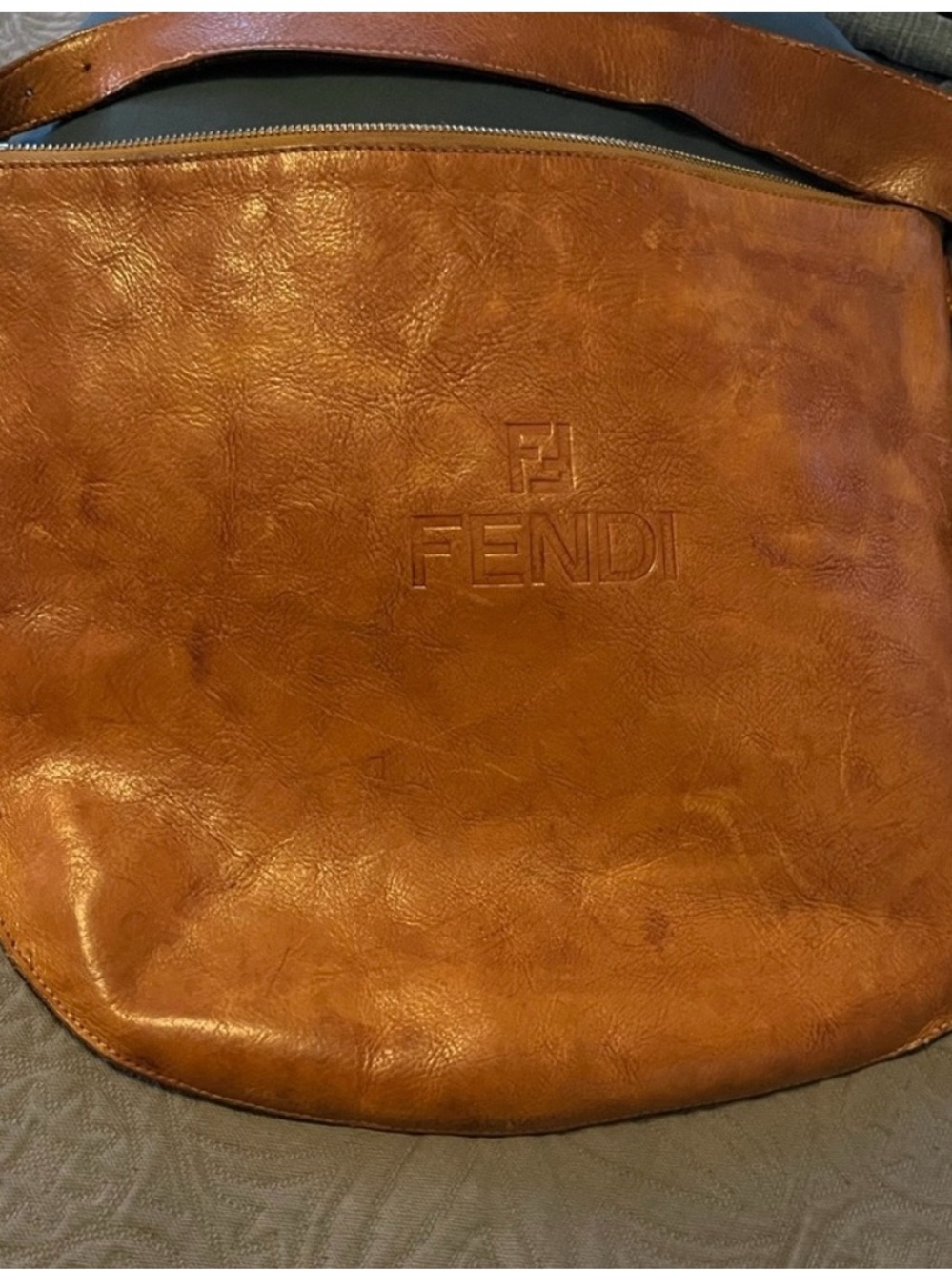Fendi Men's Cognac Leather Messenger Bag with Embossed Logo
